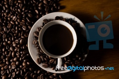 Coffe Beans And Cup Stock Photo