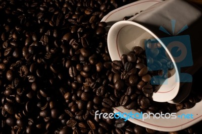 Coffe Beans And Cup Stock Photo