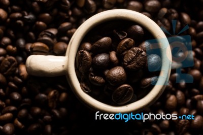 Coffe Beans And Cup Stock Photo