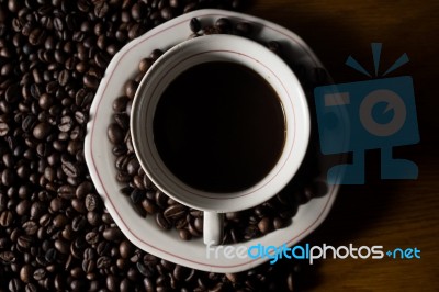 Coffe Beans And Cup Stock Photo