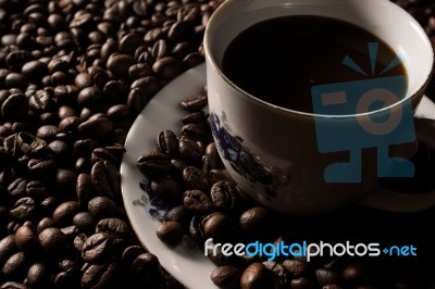 Coffe Beans And Cup Stock Photo