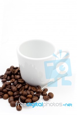 Coffe Beans With A Cup And Spoon Stock Photo