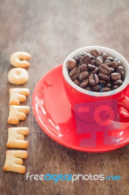 Coffee Alphabet Biscuit With Red Coffee Cup Stock Photo