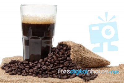 Coffee And Beans Background Stock Photo