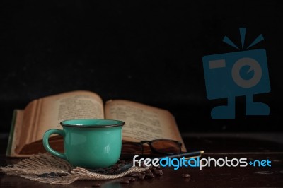 Coffee And Books On Desk Stock Photo