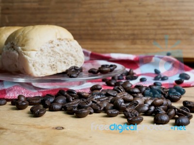 Coffee And Bread Wooden Background Stock Photo