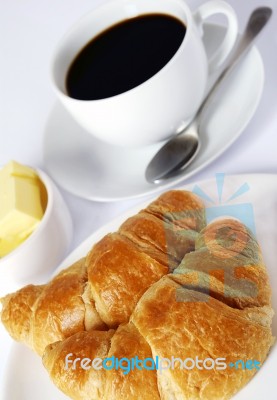 Coffee And Croissant Stock Photo