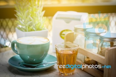 Coffee And Tea Cup On The Table In A Coffee Shop Stock Photo