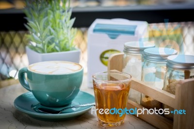 Coffee And Tea Cup On The Table In A Coffee Shop Stock Photo