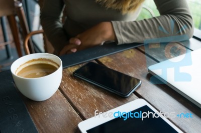 Coffee And The Women In Cafes With Mobile Phones, Lapto Stock Photo