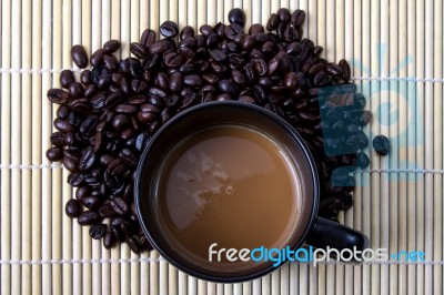 Coffee Bean And Hot Coffee Stock Photo