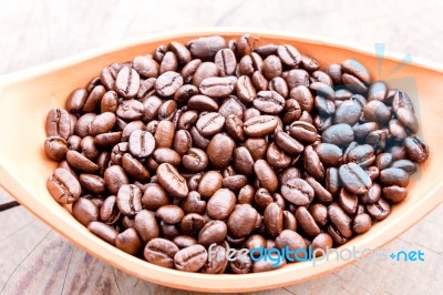 Coffee Bean In Bowl On Grunge Wood Background Stock Photo