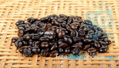 Coffee Bean On The Wooden Background Stock Photo