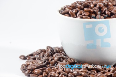 Coffee Beans And Cup Stock Photo