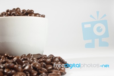 Coffee Beans And Cup Stock Photo