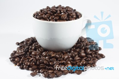 Coffee Beans And Cup Stock Photo