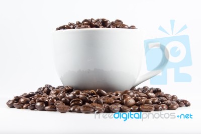 Coffee Beans And Cup Stock Photo