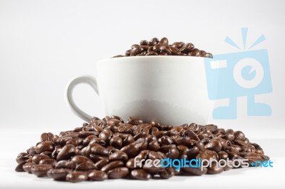 Coffee Beans And Cup Stock Photo