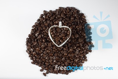 Coffee Beans And Cup Stock Photo