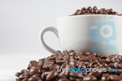 Coffee Beans And Cup Stock Photo