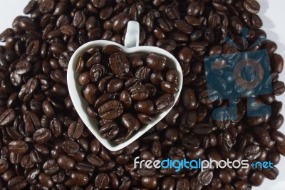 Coffee Beans And Cup Stock Photo