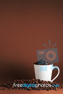 Coffee Beans And Mug Stock Photo