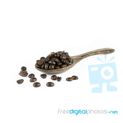 Coffee Beans In Olive Wood Spoon Stock Photo