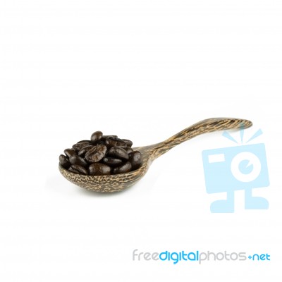 Coffee Beans In Olive Wood Spoon Stock Photo