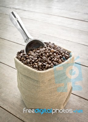 Coffee Beans In Sack Stock Photo