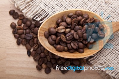 Coffee Beans In Spoon Stock Photo