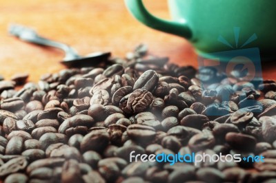 Coffee Beans On Wooden Stock Photo