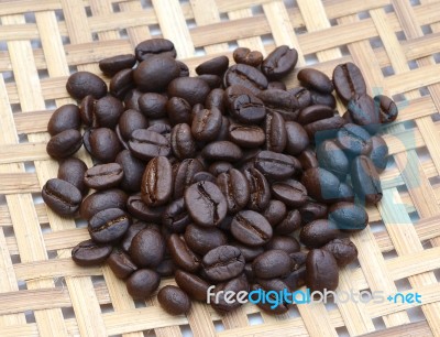 Coffee Beans On Wooden Background Stock Photo