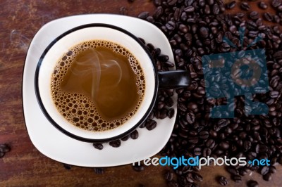 Coffee Cup And Beans Stock Photo