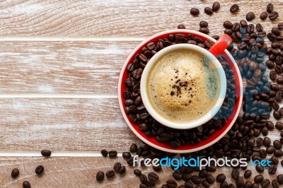 Coffee Cup And Beans Stock Photo