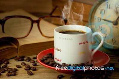 Coffee Cup And Coffee Beans Stock Photo