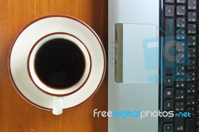 Coffee Cup And Laptop Stock Photo