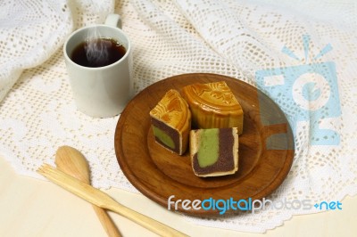 Coffee Cup And Moon Cake Stock Photo