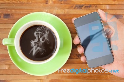 Coffee Cup And Smartphone Stock Photo