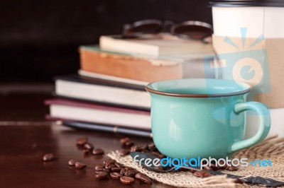 Coffee Cup On The Desk Stock Photo