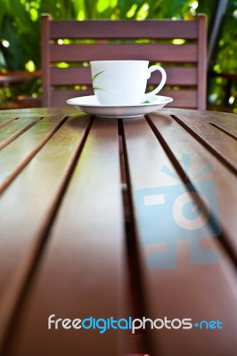 Coffee Cup On Wood Table Stock Photo