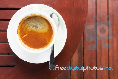 Coffee Cup On Wooden Table Stock Photo