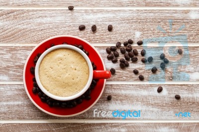 Coffee Cup On Wooden Table Stock Photo