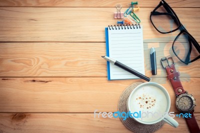 Coffee Cup On Workspace Wood Table Stock Photo