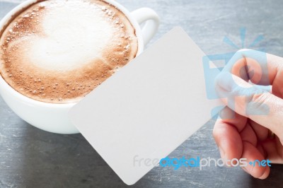 Coffee Cup With Name Card On Grey Background Stock Photo