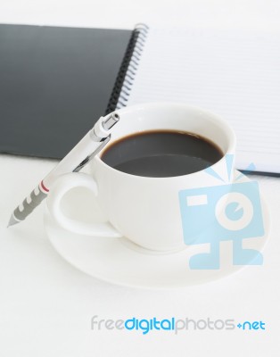 Coffee Cup With Note Book And Pencil Stock Photo