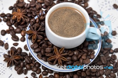 Coffee Cup With Spreaded Beans Stock Photo