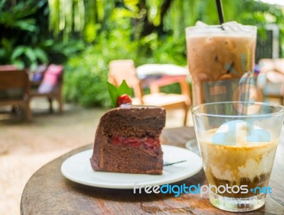 Coffee Drinks And Black Forest Cake Stock Photo