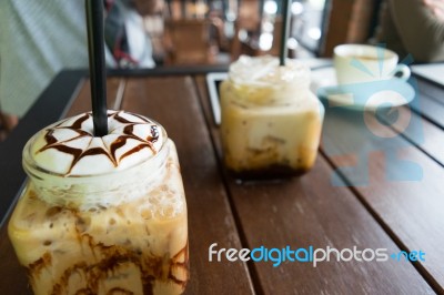 Coffee, Iced Coffee Mocha On Table Wood Background In Cafe Stock Photo