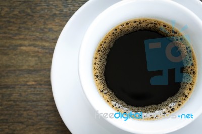 Coffee In White Cup On Wood Table Stock Photo