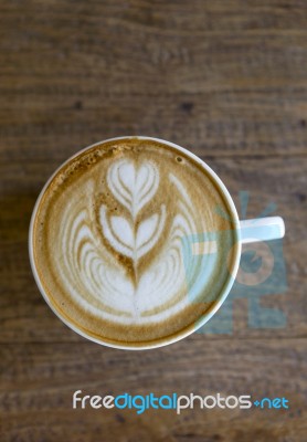 Coffee Late Art On Wood Background Stock Photo